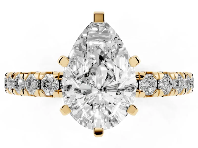Pear Cut Diamond Pavé Solitaire Ring Set in Yellow gold with Round Band and Prong Setting