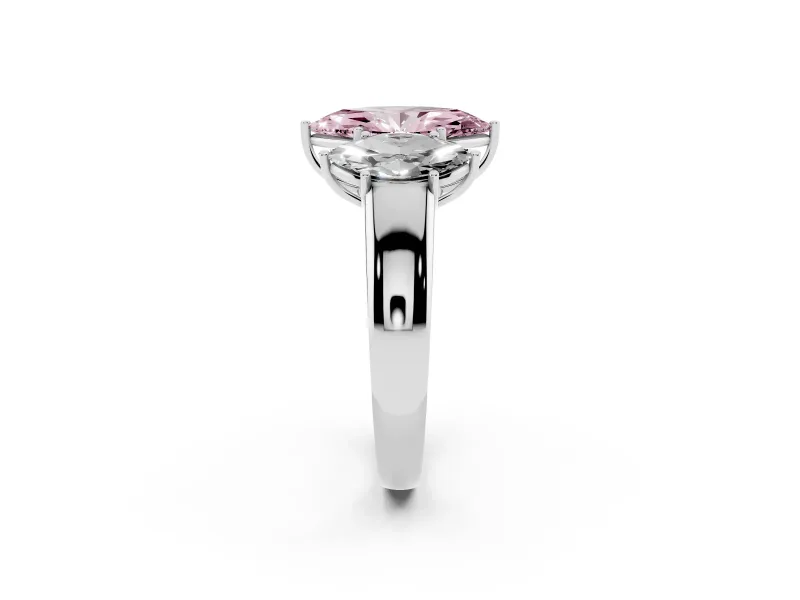 Fancy Pink Three-Stone Marquise Cut Diamond Ring Set in Platinum with Matching Prong Settings and Plain Band