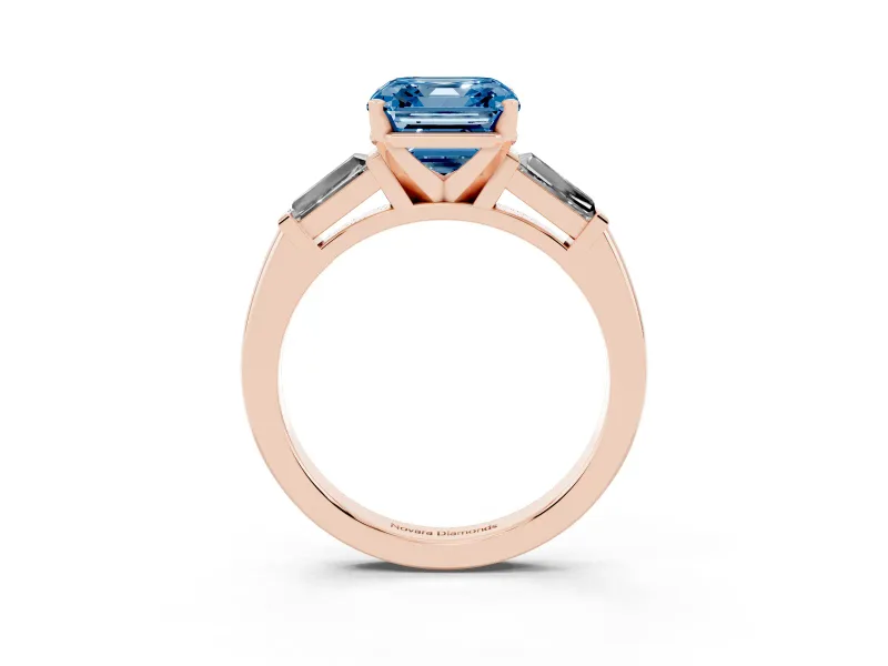 Fancy Blue Asscher Cut Diamond Solitaire Ring Set in Rose gold with Tapered Baguette Side Stones and Prong Setting