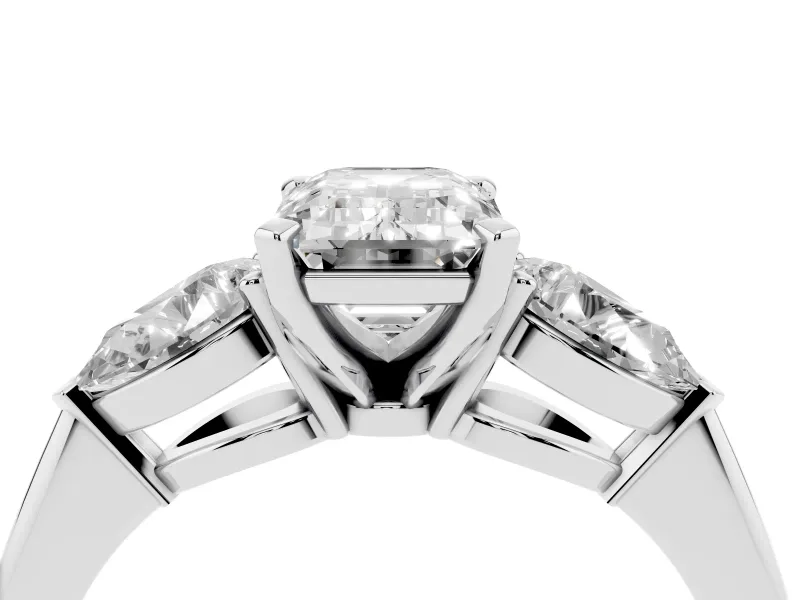 Three-Stone Emerald Cut Diamond Ring Set in White gold with Pear Side Stones and Prong Setting