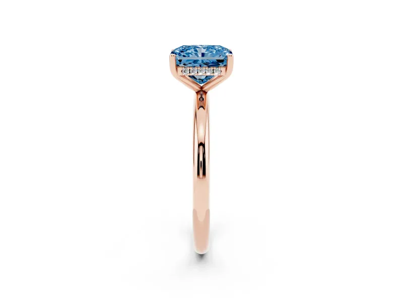 Fancy Blue Radiant Cut Diamond Solitaire Engagement Ring Set in Rose gold with Prong Setting and Polished Band