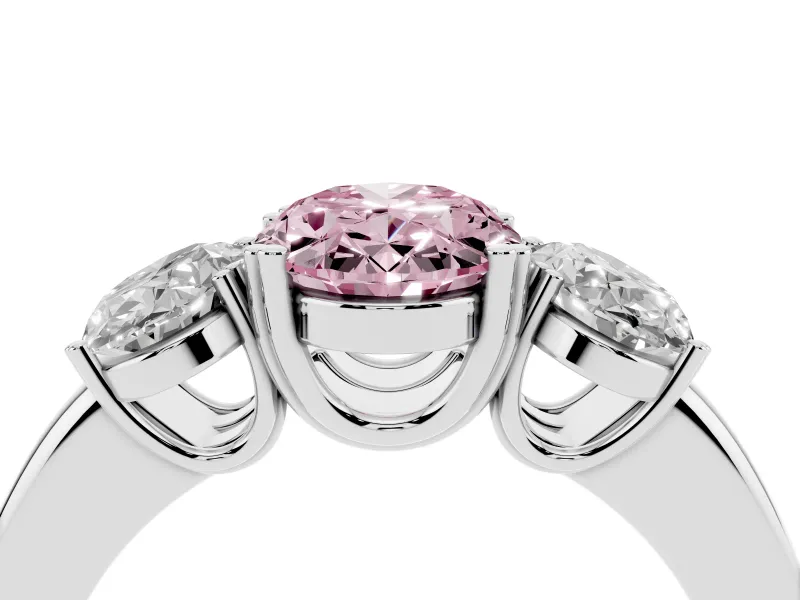 Fancy Pink Oval Cut Diamond Three-Stone Ring Set in Platinum with Polished Band and Prong Setting