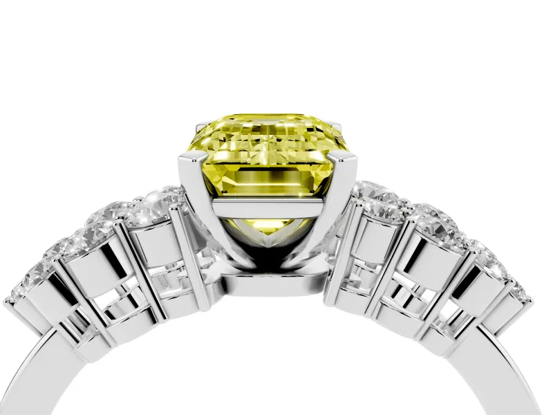 Fancy Yellow Emerald Cut Diamond Cluster Engagement Ring Set in Platinum with Pavé Band and Prong Setting