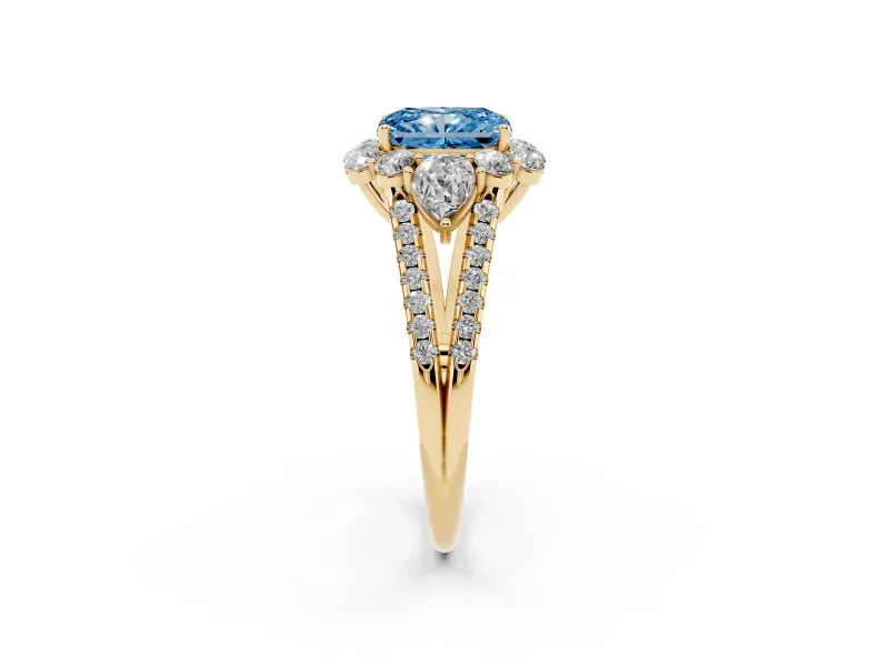 Fancy Blue Radiant Cut Diamond Halo Split Shank Engagement Ring Set in Yellow gold with Prong-Held Center Stone