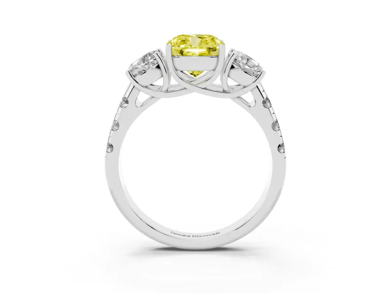 Fancy Yellow Cushion Cut Diamond Three-Stone Ring Set in Platinum with Pavé Band