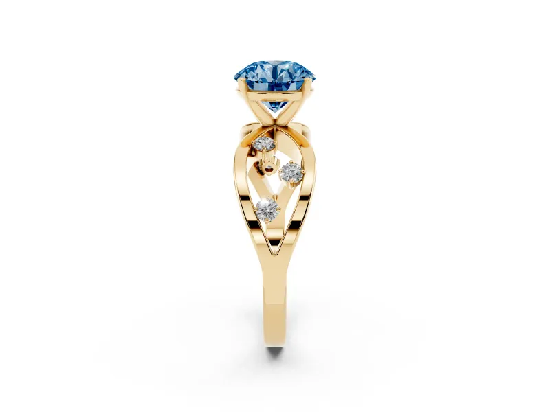 Fancy Blue Round Cut Diamond Solitaire Ring Set in Yellow gold with Side Stones on Criss-Cross Band and Prong Setting