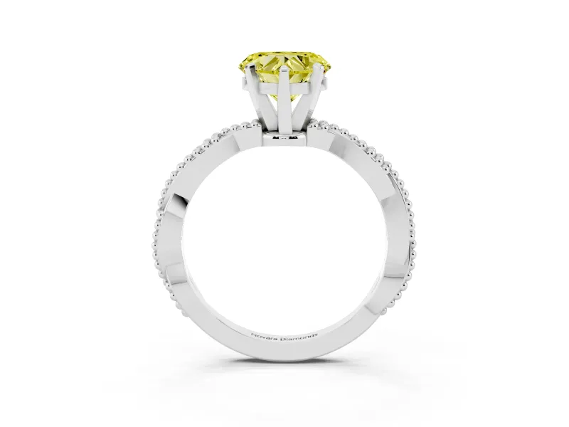 Fancy Yellow Heart Cut Diamond Solitaire Ring Set in Platinum with Twisted Band and Bead Prong Setting