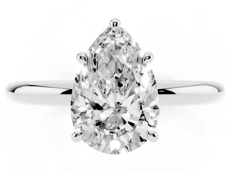 Pear Cut Diamond Solitaire Ring Set in Platinum with Thin Band and Prong Setting