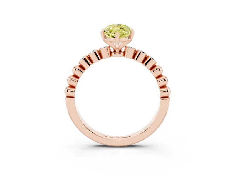 Fancy Yellow Marquise Cut Diamond Solitaire Engagement Ring Set in Rose gold with Bezel Accents on Beaded Band