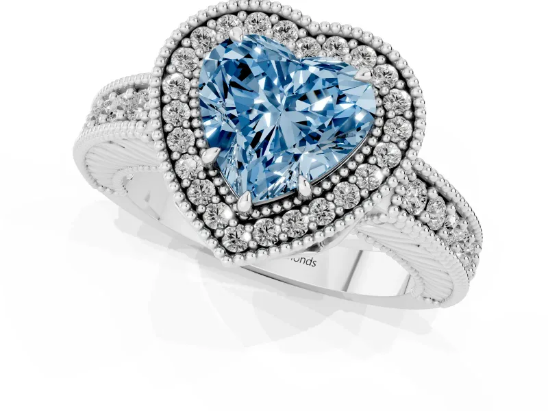Fancy Blue Heart Cut Diamond Halo Ring Set in Platinum with Round Accent Halo, Pavé Band and Prong Setting