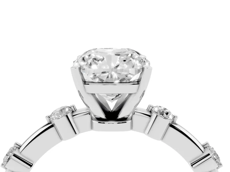 Cushion Cut Diamond Solitaire Ring Set in White gold with Bezel Set Side Stones and Prong Setting