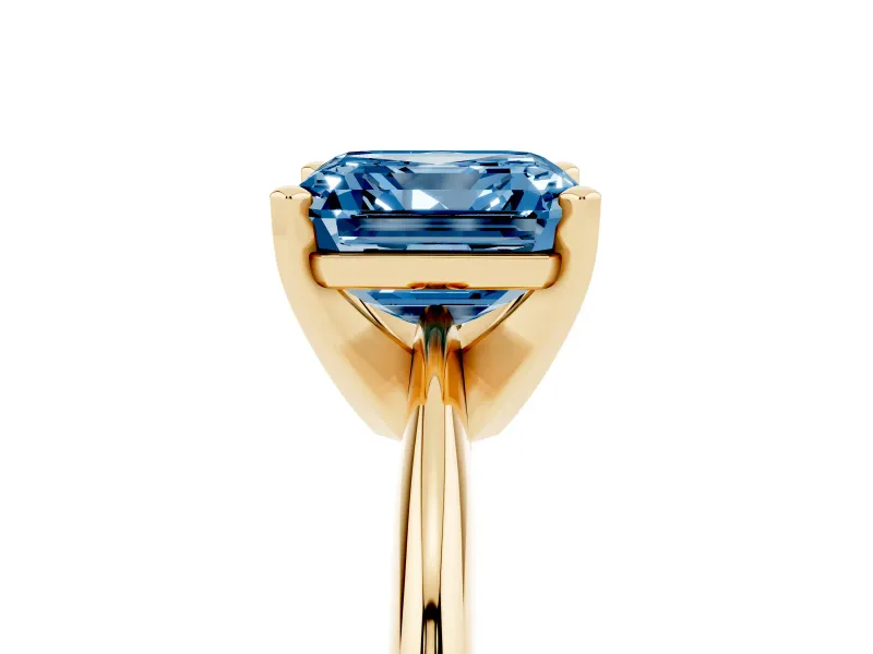 Fancy Blue Asscher Cut Diamond Solitaire Ring Set in Yellow gold with Prong Setting on a Plain Round Band