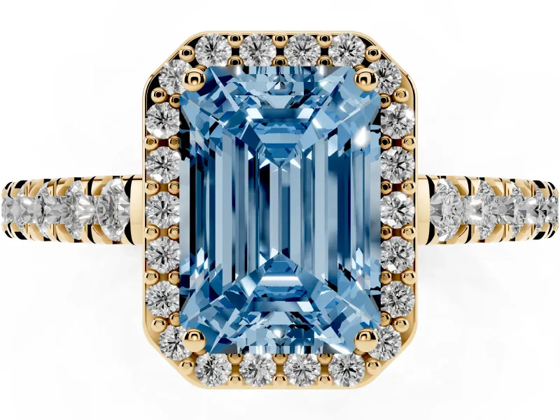 Fancy Blue Emerald Cut Diamond Halo Engagement Ring Set in Yellow gold with Pavé Band and Prong Setting