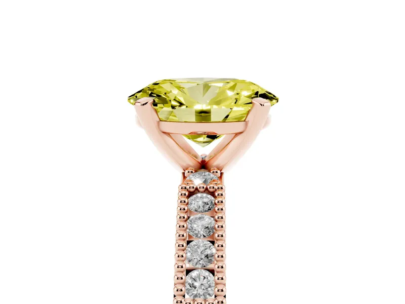 Fancy Yellow Oval Cut Diamond Solitaire Ring Set in Rose gold with Slim Pavé Band and Prong Setting