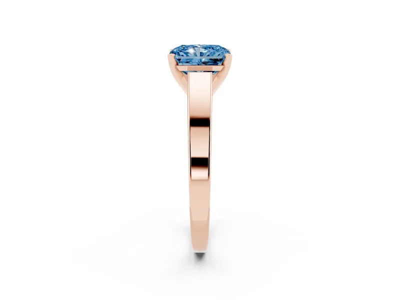 Fancy Blue Radiant Cut Diamond Solitaire Engagement Ring Set in Rose gold with Prong Setting and Tapered Band