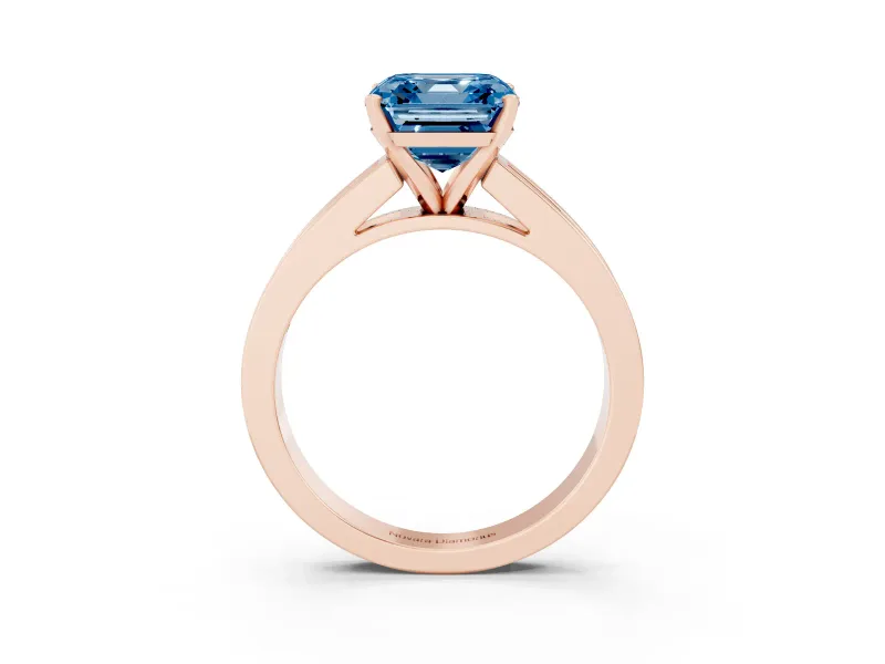 Fancy Blue Asscher Cut Diamond Solitaire Ring Set in Rose gold with Channel-Set Band and Prong Setting