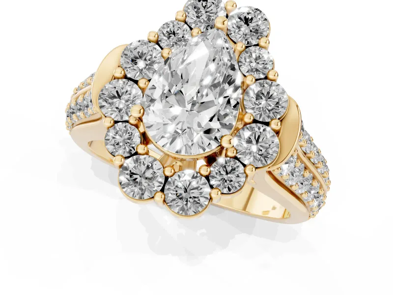 Pear Cut Diamond Halo Engagement Ring Set in Yellow gold with Split Shank and Prong Setting