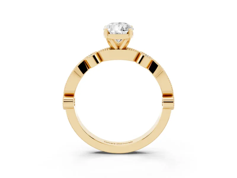 Pear Cut Diamond Solitaire Engagement Ring Set in Yellow gold with Milgrain Bezel Accent Band