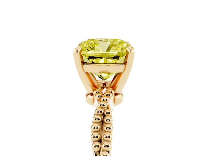 Fancy Yellow Cushion Cut Diamond Solitaire Ring Set in Yellow gold with Twisted Band and Bead Prong Setting