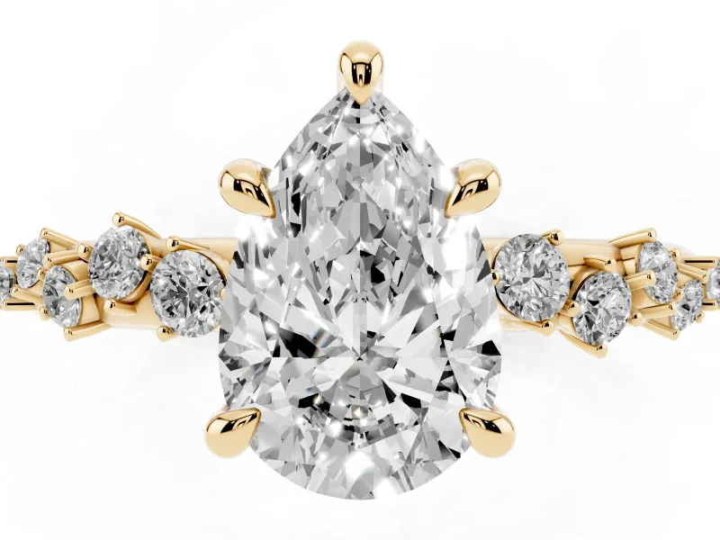 Pear Cut Diamond Solitaire Vine Band Ring Set in Yellow gold with Round Accents and Prong Setting