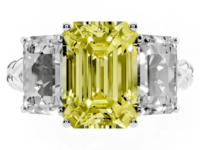 Fancy Yellow Emerald Cut Diamond Three-Stone Ring Set in White gold with Braided Band
