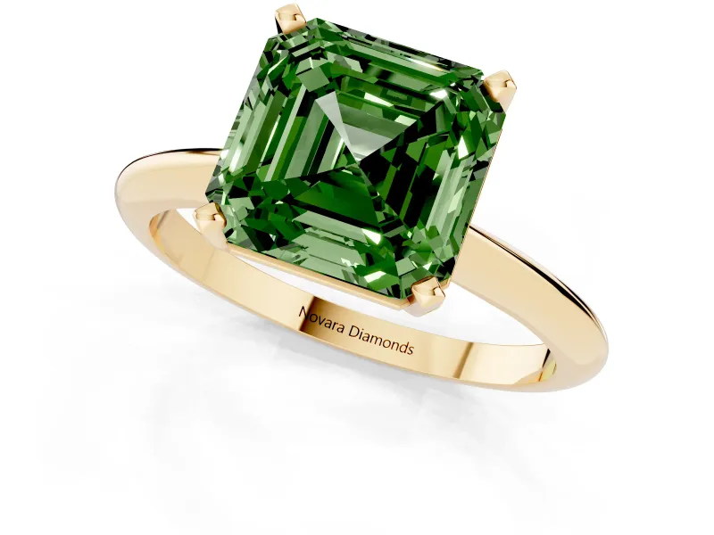 Fancy Green Asscher Cut Diamond Solitaire Ring Set in Yellow gold with Prong Setting on a Plain Round Band