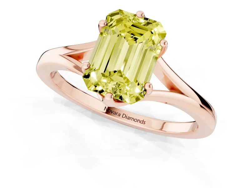Fancy Yellow Emerald Cut Diamond Solitaire Ring Set in Rose gold with Polished Tapered Band and Prong Setting