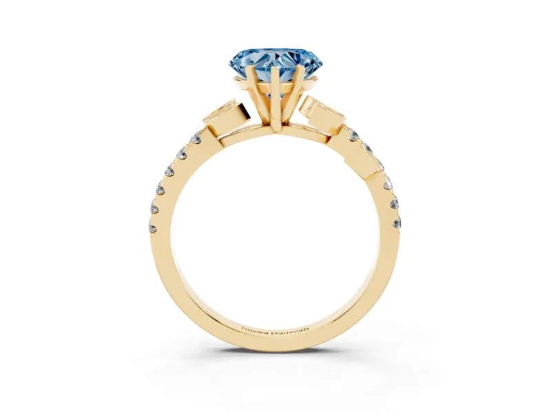 Fancy Blue Heart Cut Diamond Solitaire Leaf-Inspired Ring Set in Yellow gold with Pavé Band and Prong Setting