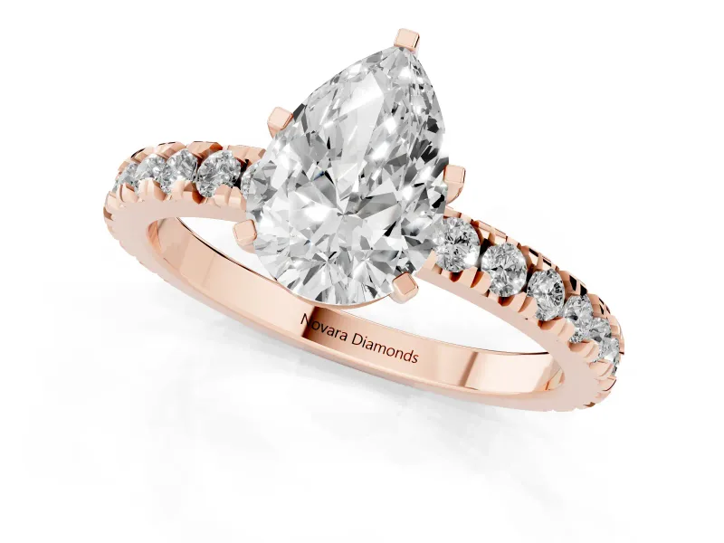 Pear Cut Diamond Pavé Band Solitaire Set in Rose gold with Prong Setting