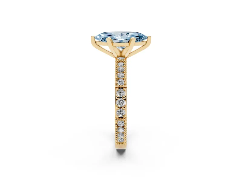 Fancy Blue Marquise Cut Diamond Solitaire Ring Set in Yellow gold with Slim Pavé Band and Prong Setting