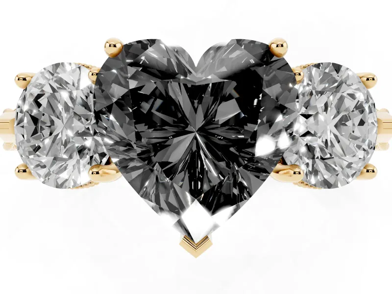 Fancy Black Heart Cut Diamond Three-Stone Ring Set in Yellow gold with Milgrain Band