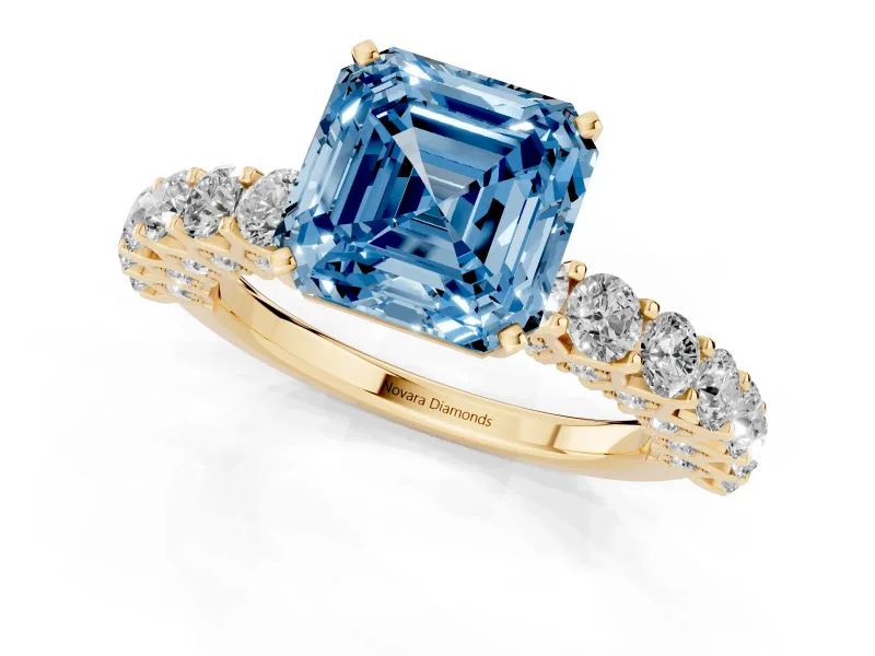 Fancy Blue Asscher Cut Diamond Solitaire Ring Set in Yellow gold with Shared Prong Pavé Band