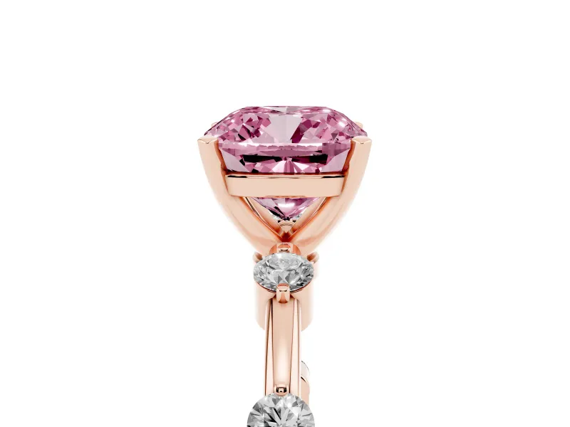 Fancy Pink Cushion Cut Diamond Solitaire Ring Set in Rose gold with Bezel Set Side Stones and Prong Setting