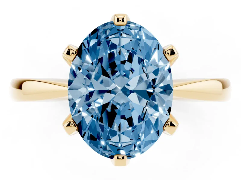 Fancy Blue Oval Cut Diamond Solitaire Engagement Ring Set in Yellow gold with Slim Tapered Solitaire Band