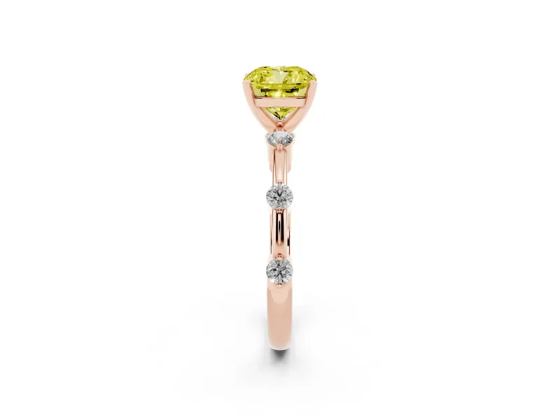 Fancy Yellow Cushion Cut Diamond Solitaire Ring Set in Rose gold with Bezel Set Side Stones and Prong Setting