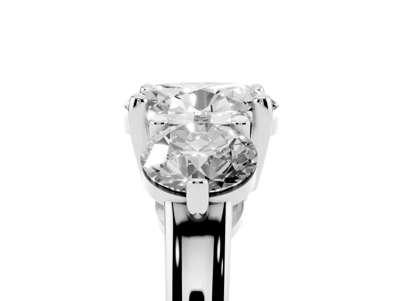 Oval Cut Diamond Three-Stone Ring Set in Platinum with Prong Setting and Classic Band