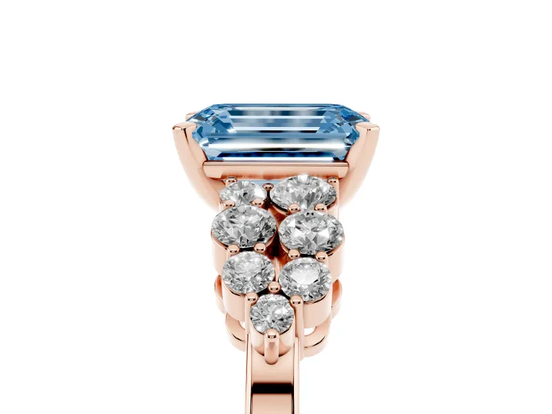 Fancy Blue Emerald Cut Diamond Cluster Engagement Ring Set in Rose gold with Pavé Band and Prong Setting