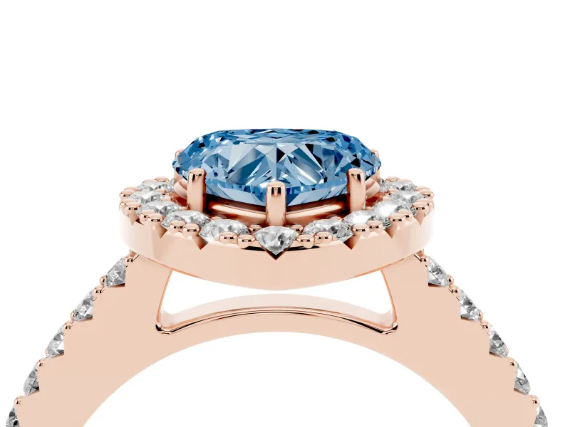 Fancy Blue Heart Cut Diamond Halo Pavé Solitaire Ring Set in Rose gold with Prong-Set Center Stone