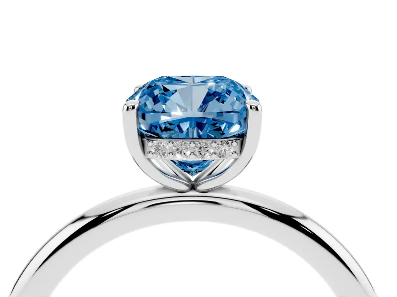Fancy Blue Cushion Cut Diamond Solitaire Ring Set in Silver with Thin Band and Prong Setting