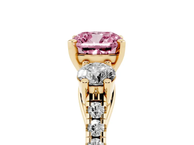 Fancy Pink Three-Stone Cushion Cut Diamond Pavé Band Ring Set in Yellow gold with Prong-Set Trio