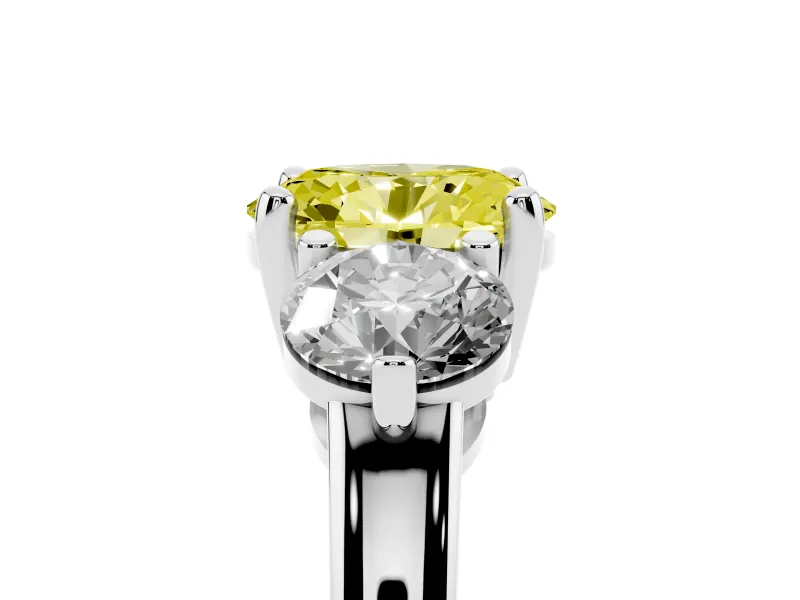 Fancy Yellow Oval Cut Diamond Three-Stone Ring Set in White gold with Prong Setting and Classic Band