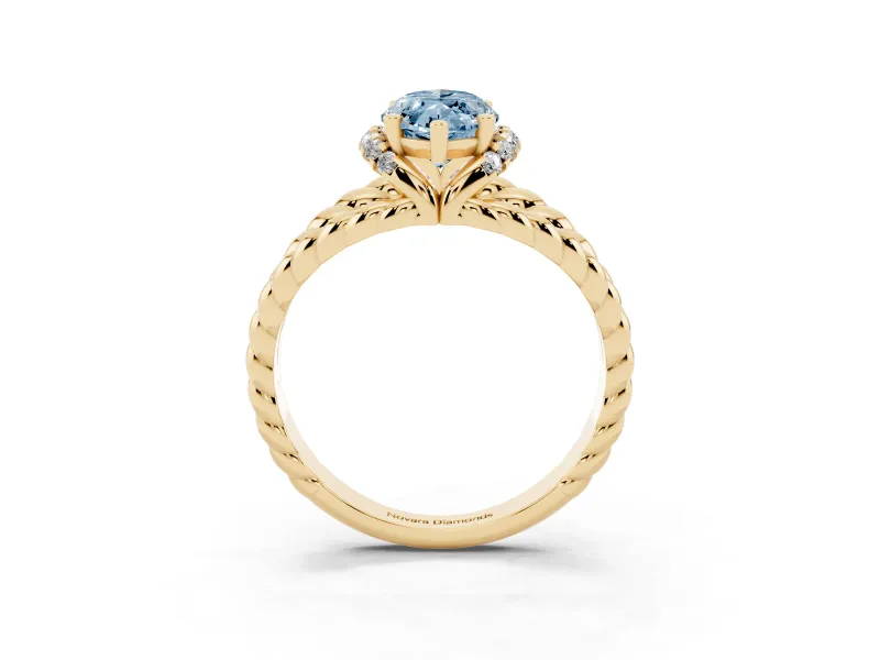 Fancy Blue Marquise Cut Diamond Halo Ring Set in Yellow gold with Twisted Band and Prong Setting