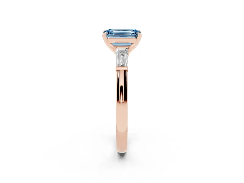 Emerald Cut Three Stone Engagement Ring Setting for a Fancy Blue Lab-Grown Diamond | Tapered Baguettes | Rose Gold