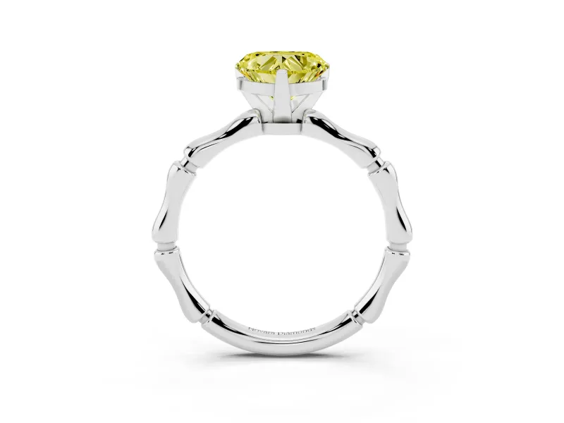 Fancy Yellow Heart Cut Diamond Solitaire Ring Set in White gold with Bamboo Band and Prong Setting