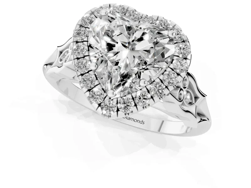 Heart Cut Diamond Halo Engagement Ring Set in Platinum with Filigree Band and Prong-Set Center