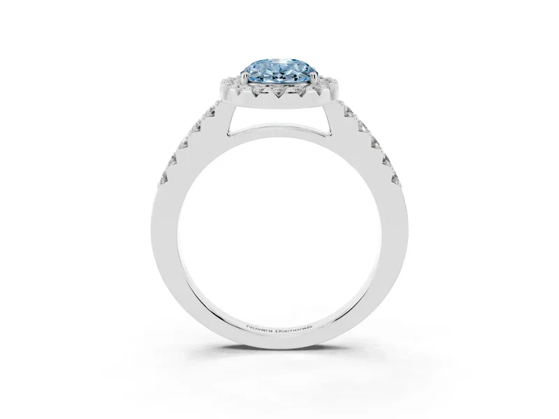 Fancy Blue Oval Cut Diamond Halo Pavé Solitaire Ring Set in Platinum with Prong-Set Center Stone