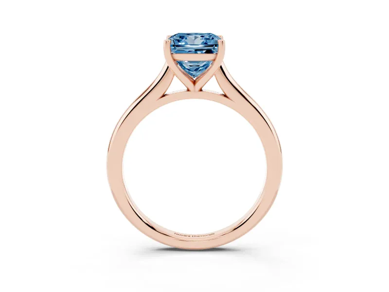 Fancy Blue Princess Cut Diamond Solitaire Ring Set in Rose gold with Cathedral Band and Prong Setting