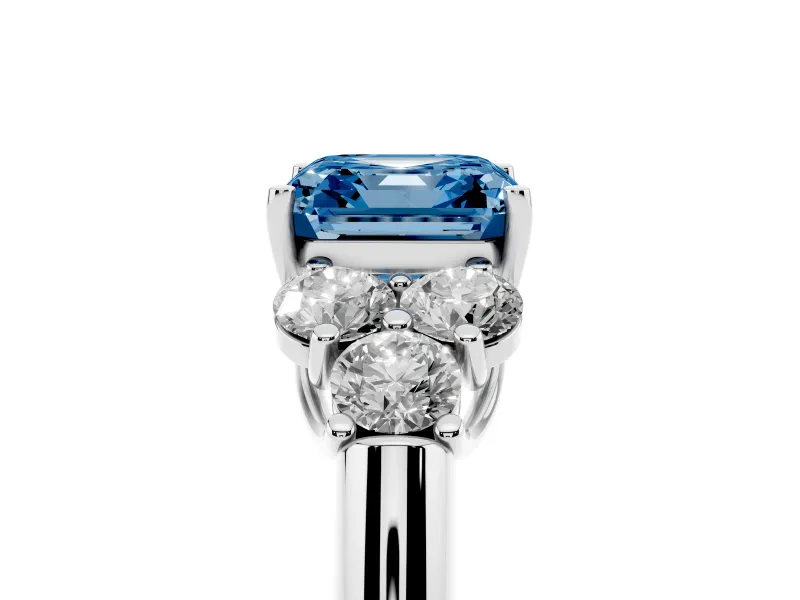 Fancy Blue Asscher Cut Diamond Cluster Ring Set in Platinum with Round Accent Stones and Prong Setting on a Plain Band