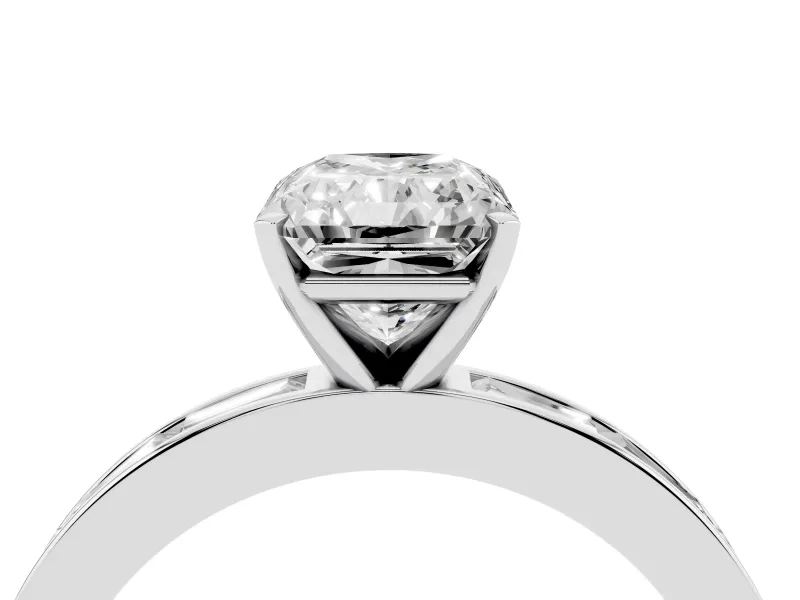 Radiant Cut Diamond Solitaire Ring Set in Platinum with Channel-Set Baguette Band and Prong Setting