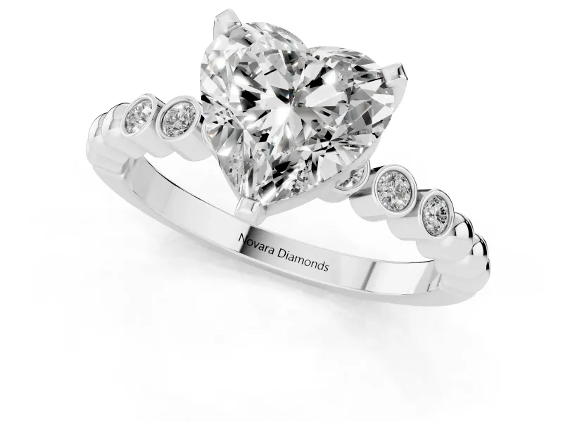 Heart Cut Diamond Solitaire Engagement Ring Set in White gold with Bezel Accents on Beaded Band
